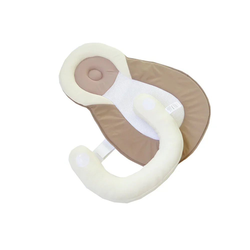 Khaki infant anti-rollover cushion with white safety pillow on white background