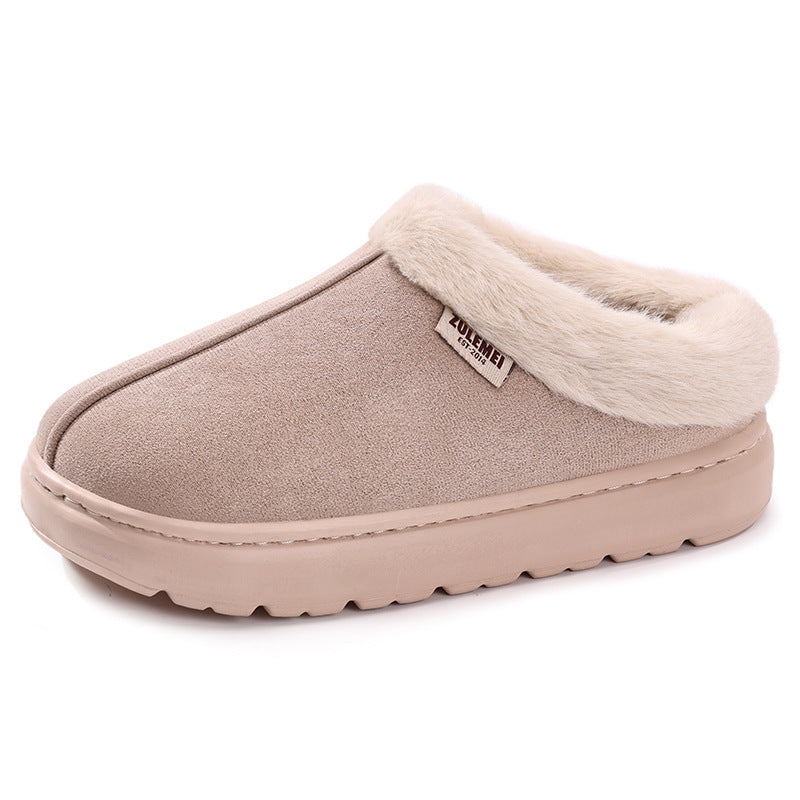Beige slipper with white fur lining on a white background