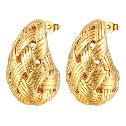 Pair of woven gold hoop stud earrings with textured metallic finish on white background
