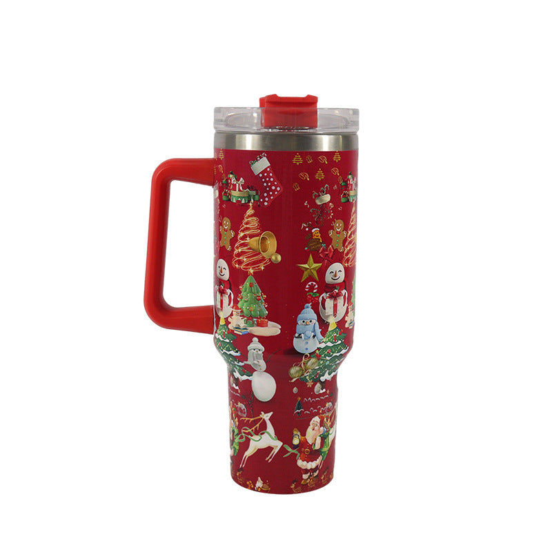 Red tumbler with Christmas-themed design on a white background