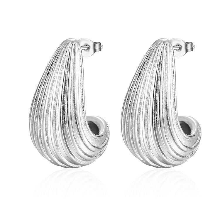 Pair of silver ribbed hoop earrings with a modern curved design and post backs
