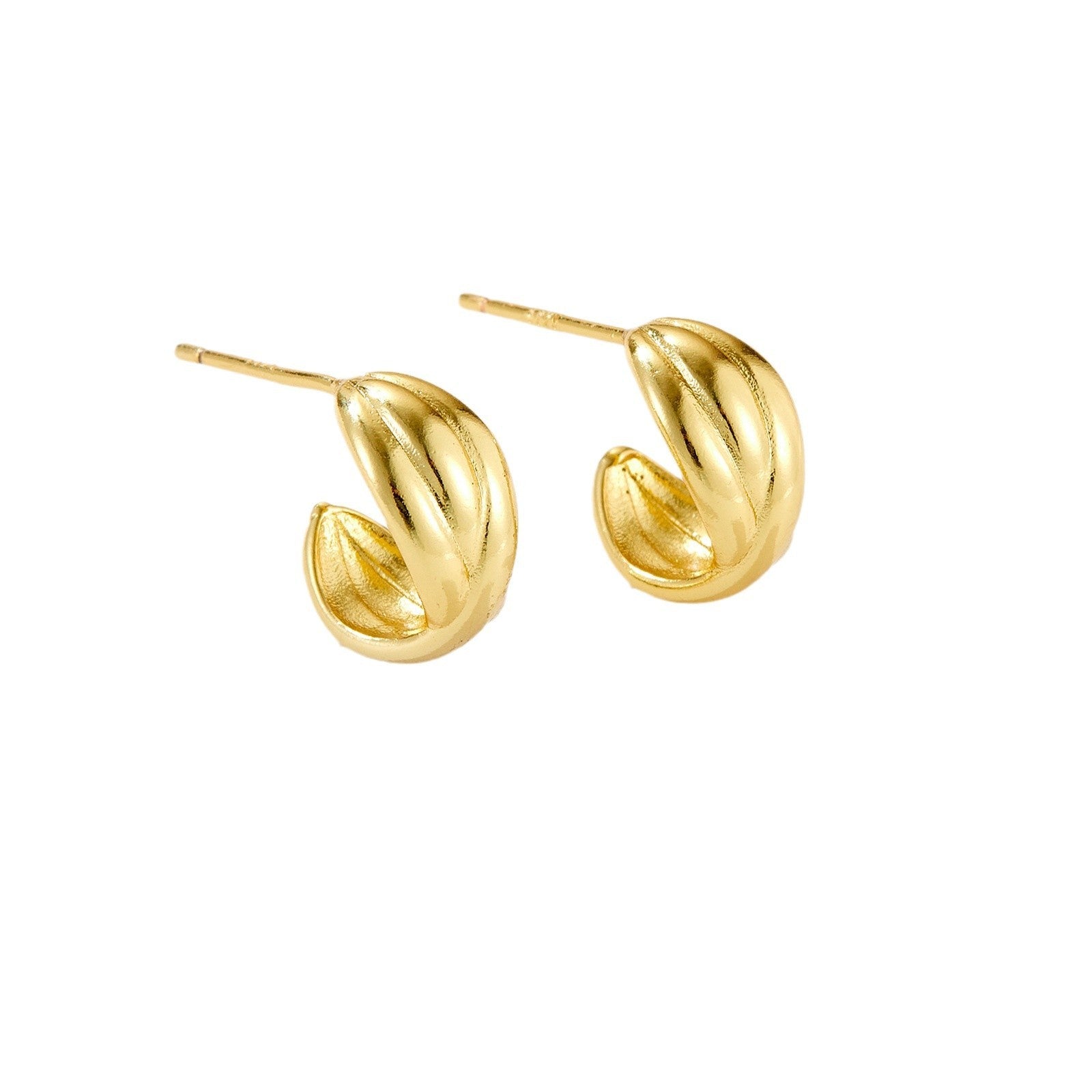 Pair of small polished gold hoop earrings with ridged design on white background