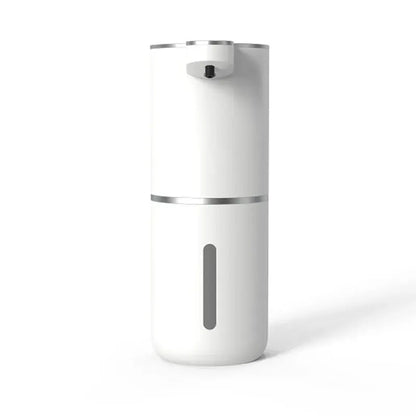 White automatic soap dispenser with silver trim and transparent soap level window on white background