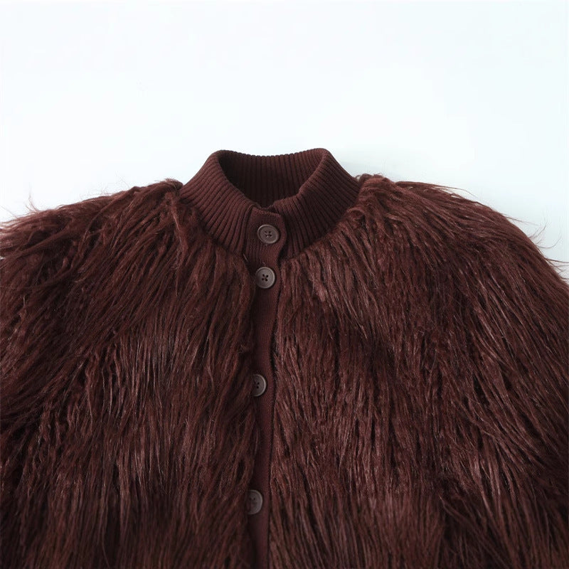 Close-up of a brown fuzzy jacket with a collar on a white background