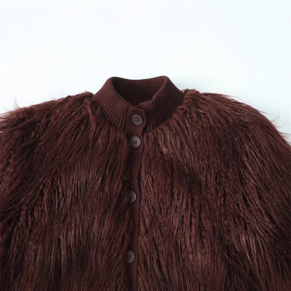 Close-up of a brown fuzzy jacket with a collar on a white background