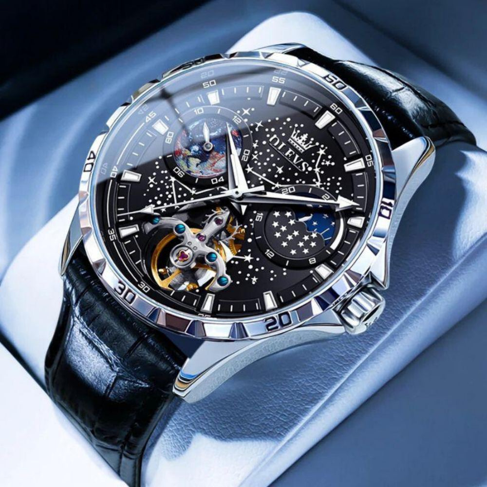 A men's luxury watch with a black dial and a pattern resembling a starry night sky, displayed on a white surface.