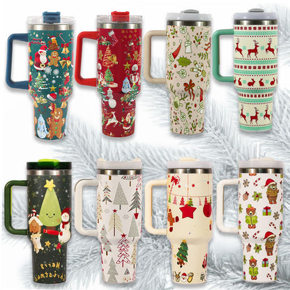 Collection of Christmas-themed tumblers with various patterns on a textured white background.