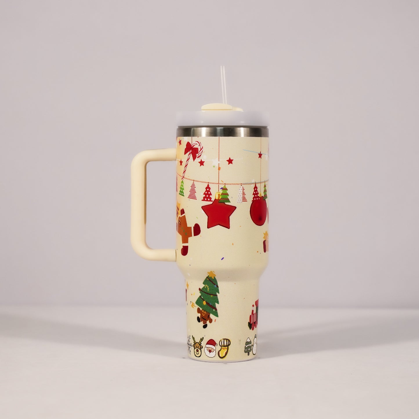Travel mug with Christmas-themed design on a light gray background