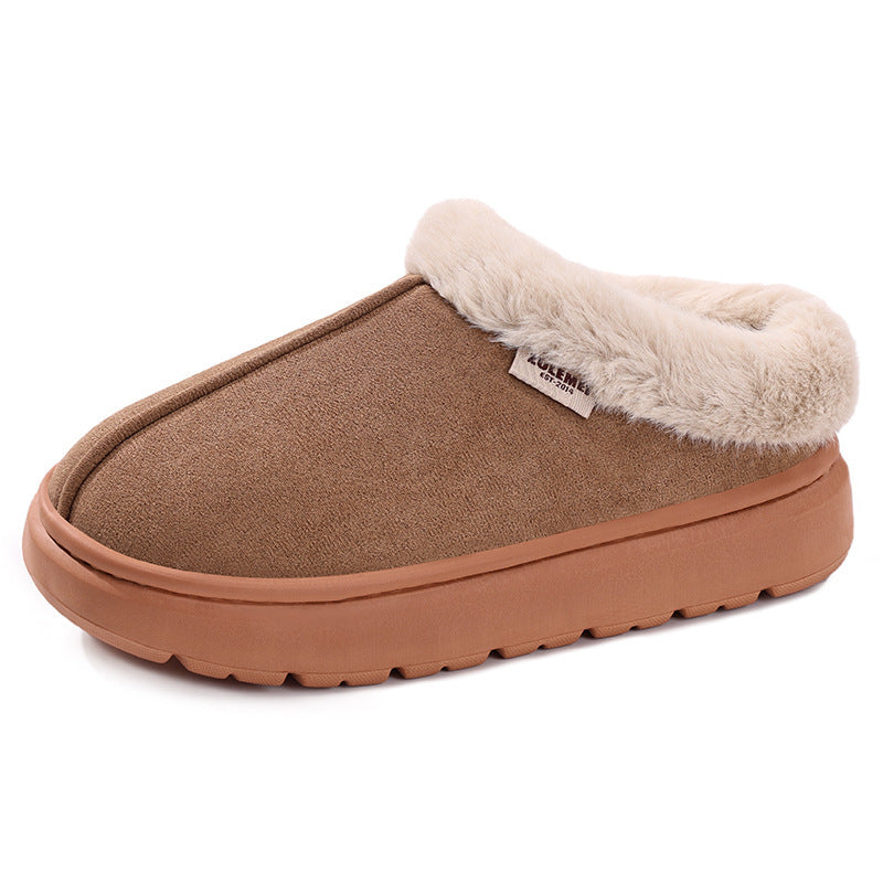 Brown slipper with beige fur lining on a white background