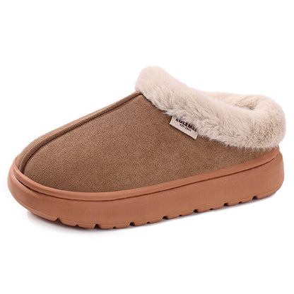 Brown slipper with beige fur lining on a white background